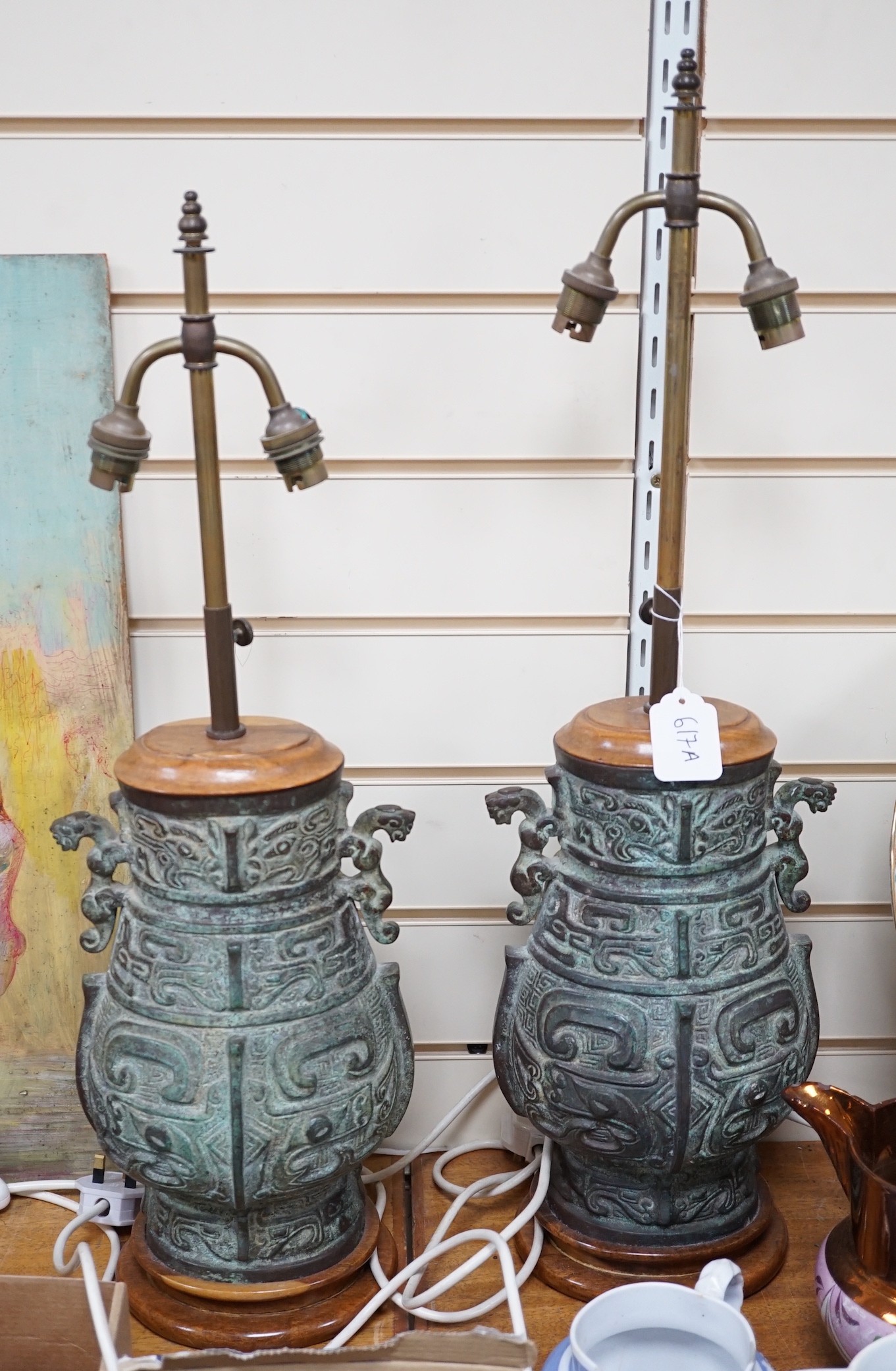 A pair of Chinese archaistic bronze ‘hu’ telescopic table lamps